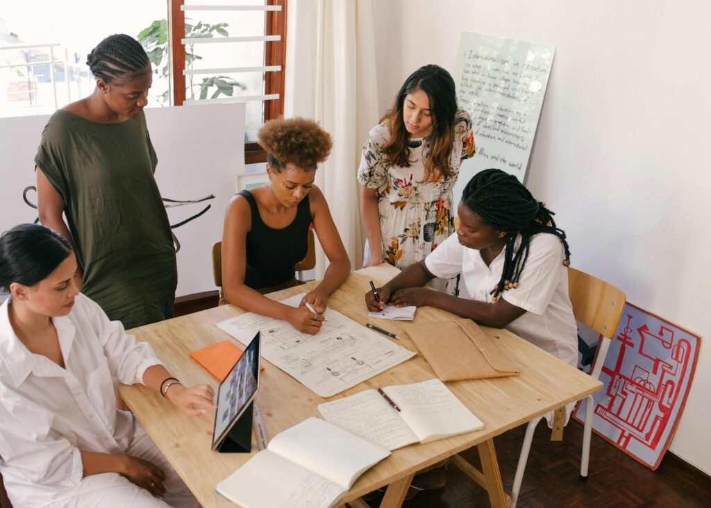 People gathered around a table planning