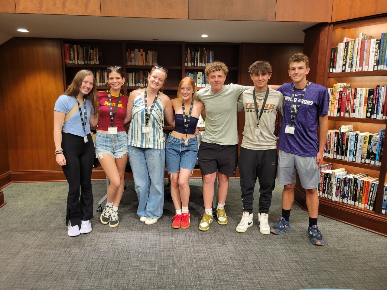 Normandy Academy students inside of a library